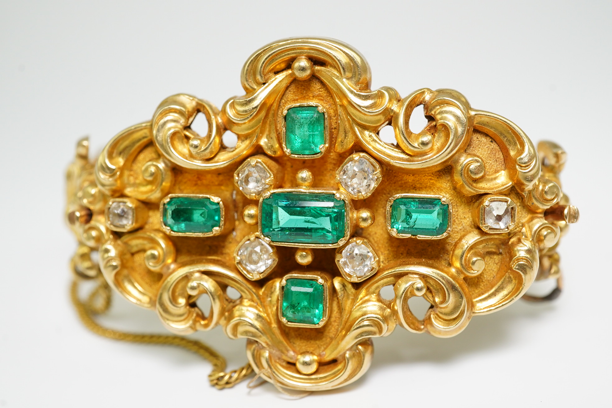 A Victorian gold, diamond and emerald cluster set bracelet